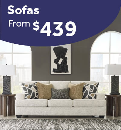 Heartcort Quartz sofa with soft upholstery and accent pillows in a modern living room.