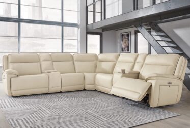 Double Deal Almond Leather 7-Piece Power Reclining Sectional With 2 Consoles